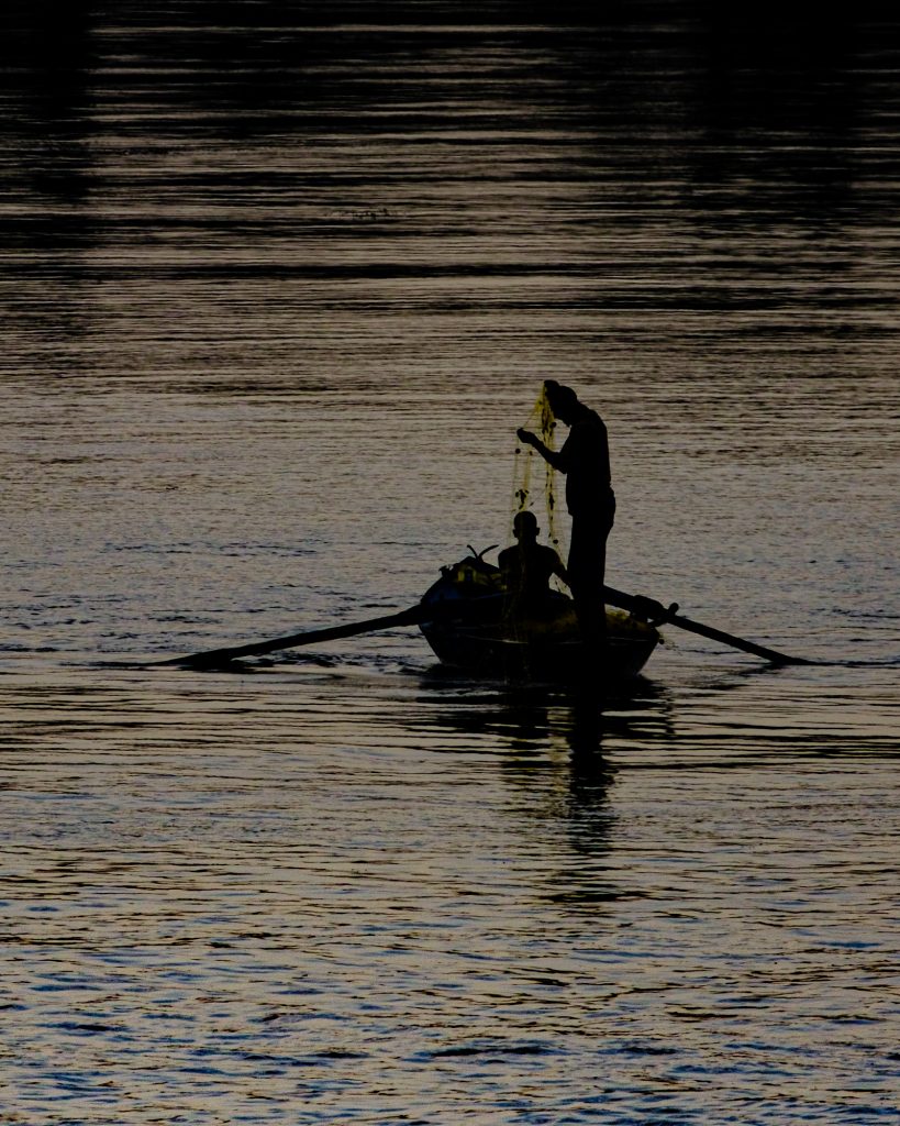 Nile river fishing silhouette